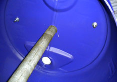 Pole going through barrel