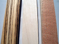 The choices of wood. Left to right: Zebra, Pine, Lacewood
